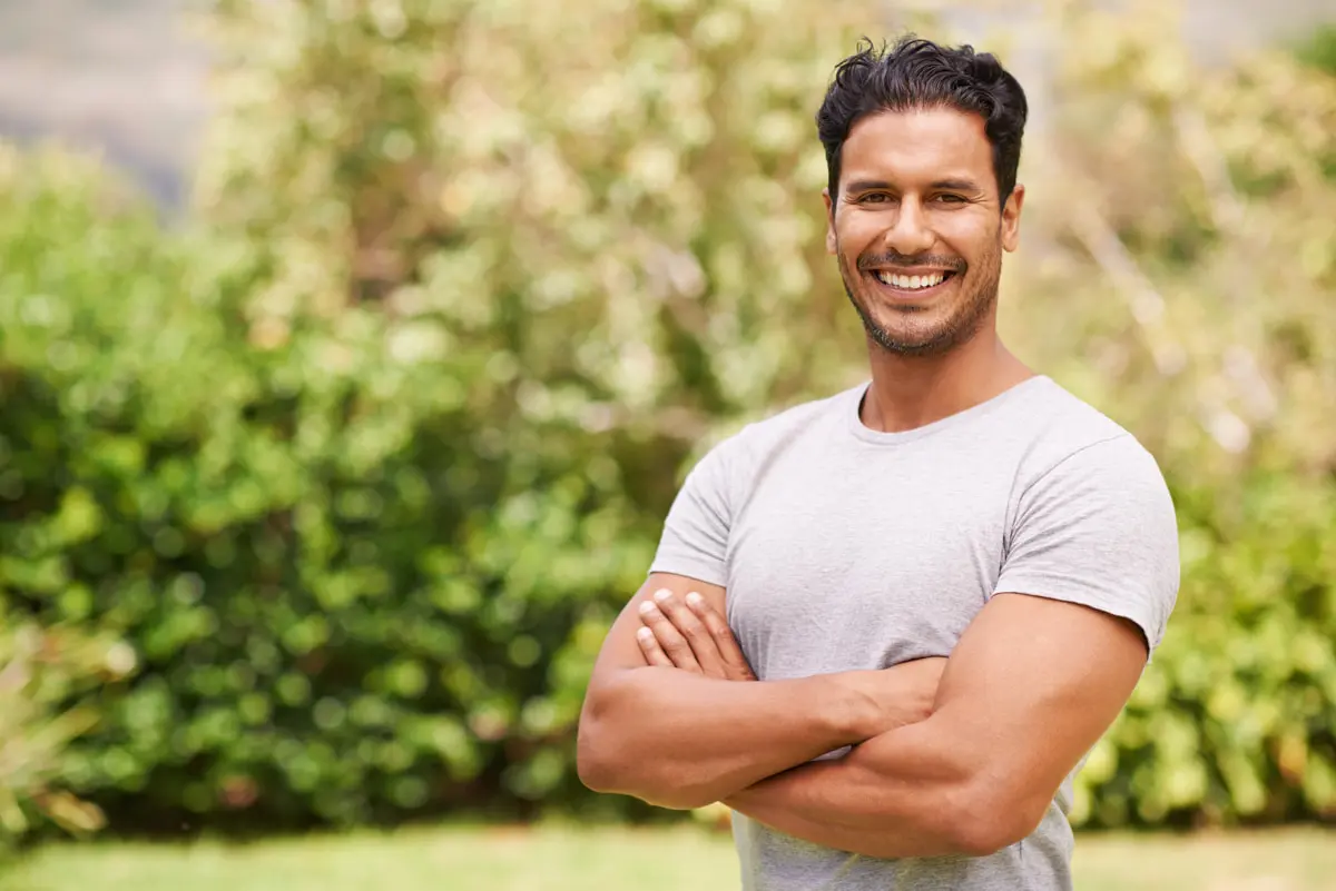man smiling after losing weight